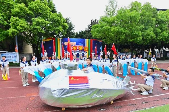 沙坪坝区高滩岩小学第十三届运动月暨第32届春季田径运动会开幕式燃情九游体育启幕(图5)